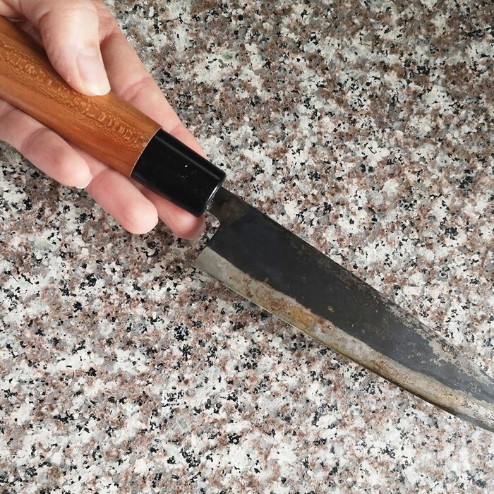 Glass stone cutting board dulls knives